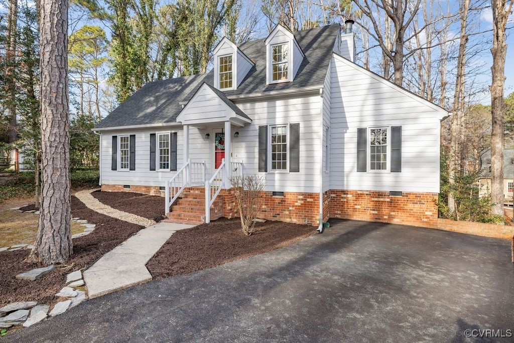 5803 Mill Spring Road Midlothian, VA 23112 - Photo 47 of 48 a front view of a house with a yard