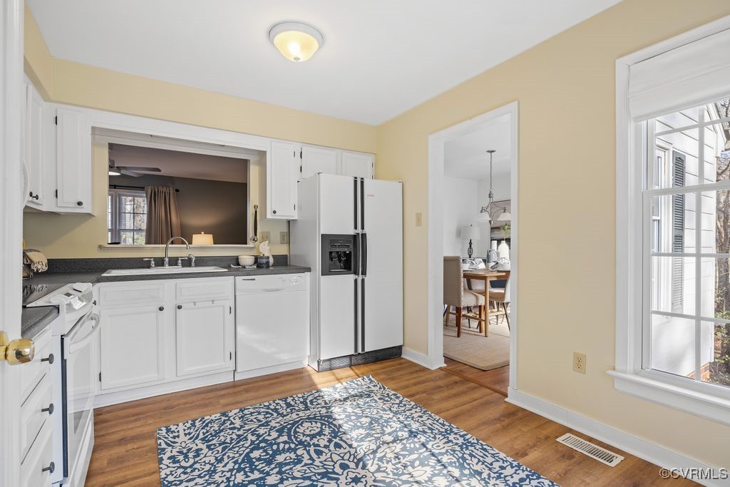 5803 Mill Spring Road Midlothian, VA 23112 - Photo 9 of 48 a kitchen with a refrigerator and a sink