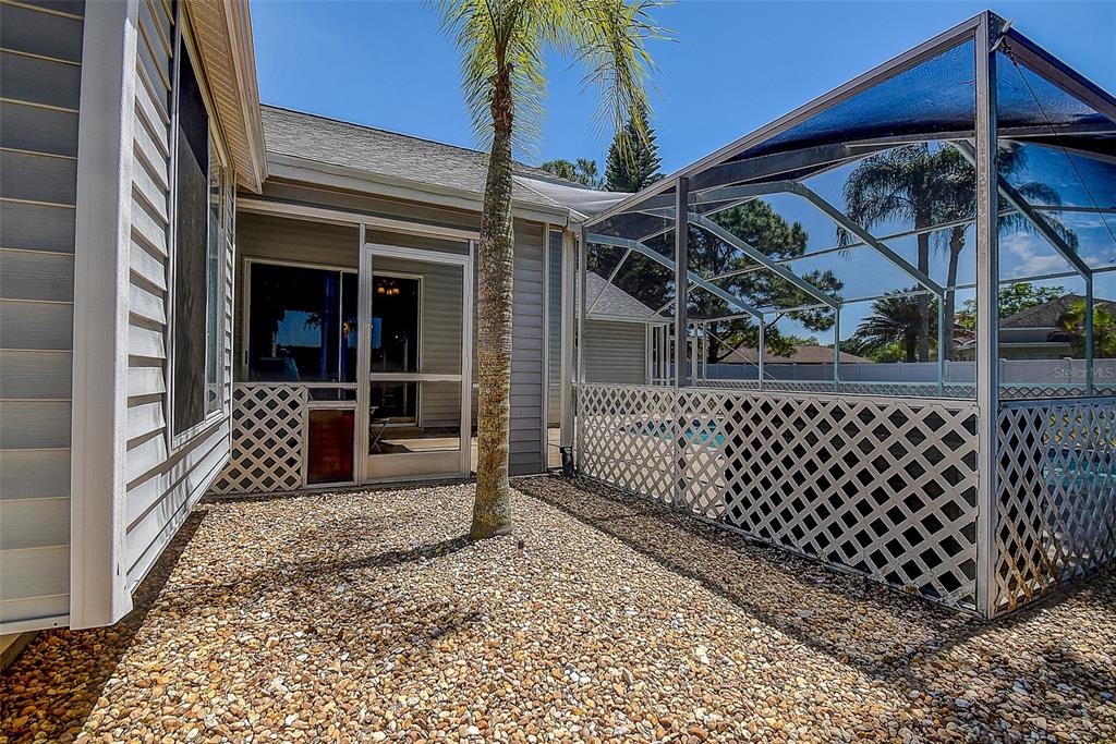 7730 Grimsby Lane New Port Richey, FL 34655 - Photo 13 of 48 a view of a balcony