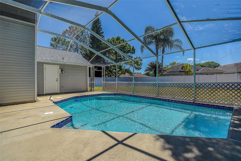 7730 Grimsby Lane New Port Richey, FL 34655 - Photo 18 of 48 a view of a backyard