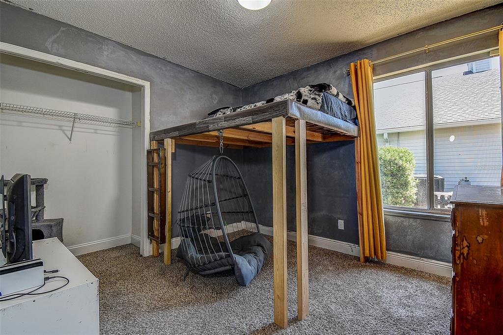 7730 Grimsby Lane New Port Richey, FL 34655 - Photo 39 of 48 a view of room with gym equipment