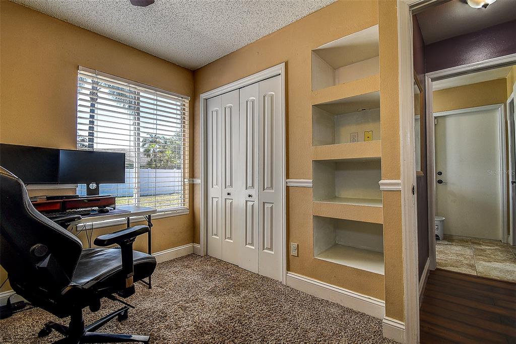 7730 Grimsby Lane New Port Richey, FL 34655 - Photo 41 of 48 a workspace with furniture and window