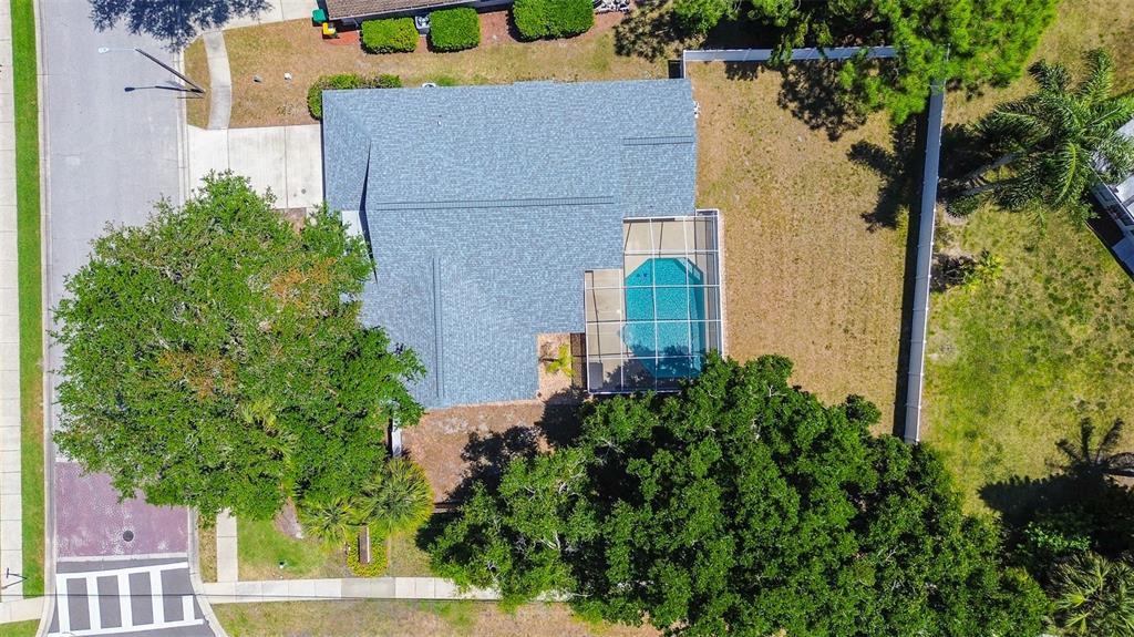 7730 Grimsby Lane New Port Richey, FL 34655 - Photo 7 of 48 an aerial view of multiple houses with yard