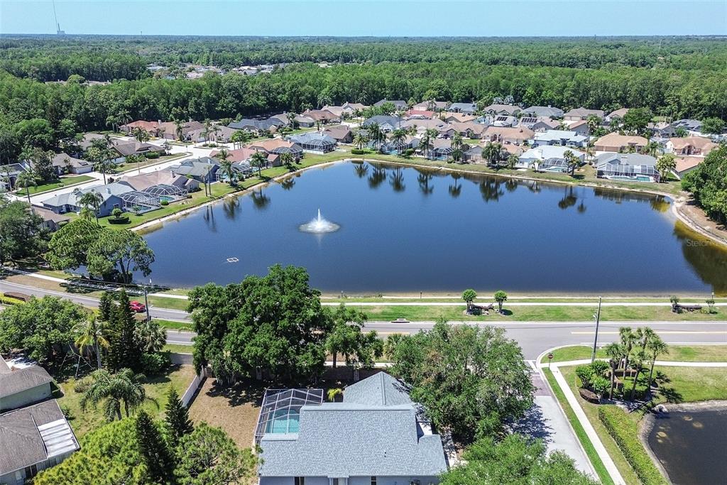7730 Grimsby Lane New Port Richey, FL 34655 - Photo 10 of 48 an aerial view of residential houses with outdoor space and river