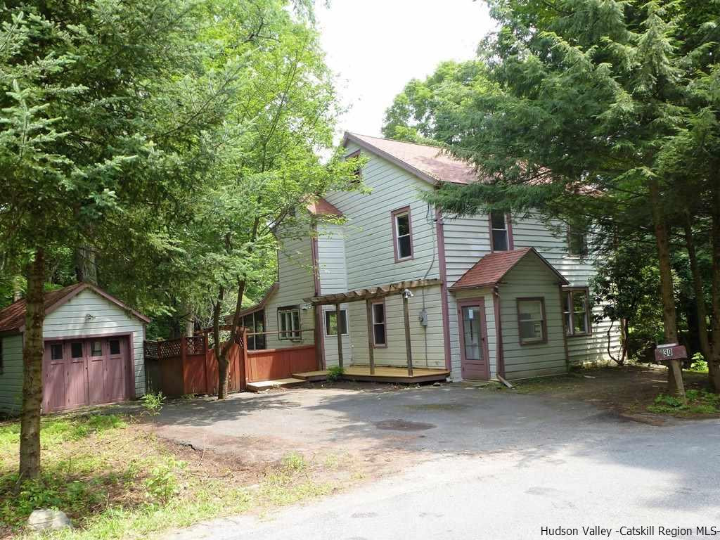30 Peak Road Stone Ridge, NY 12484 - Photo 1 of 22 a view of a house with a yard and large tree