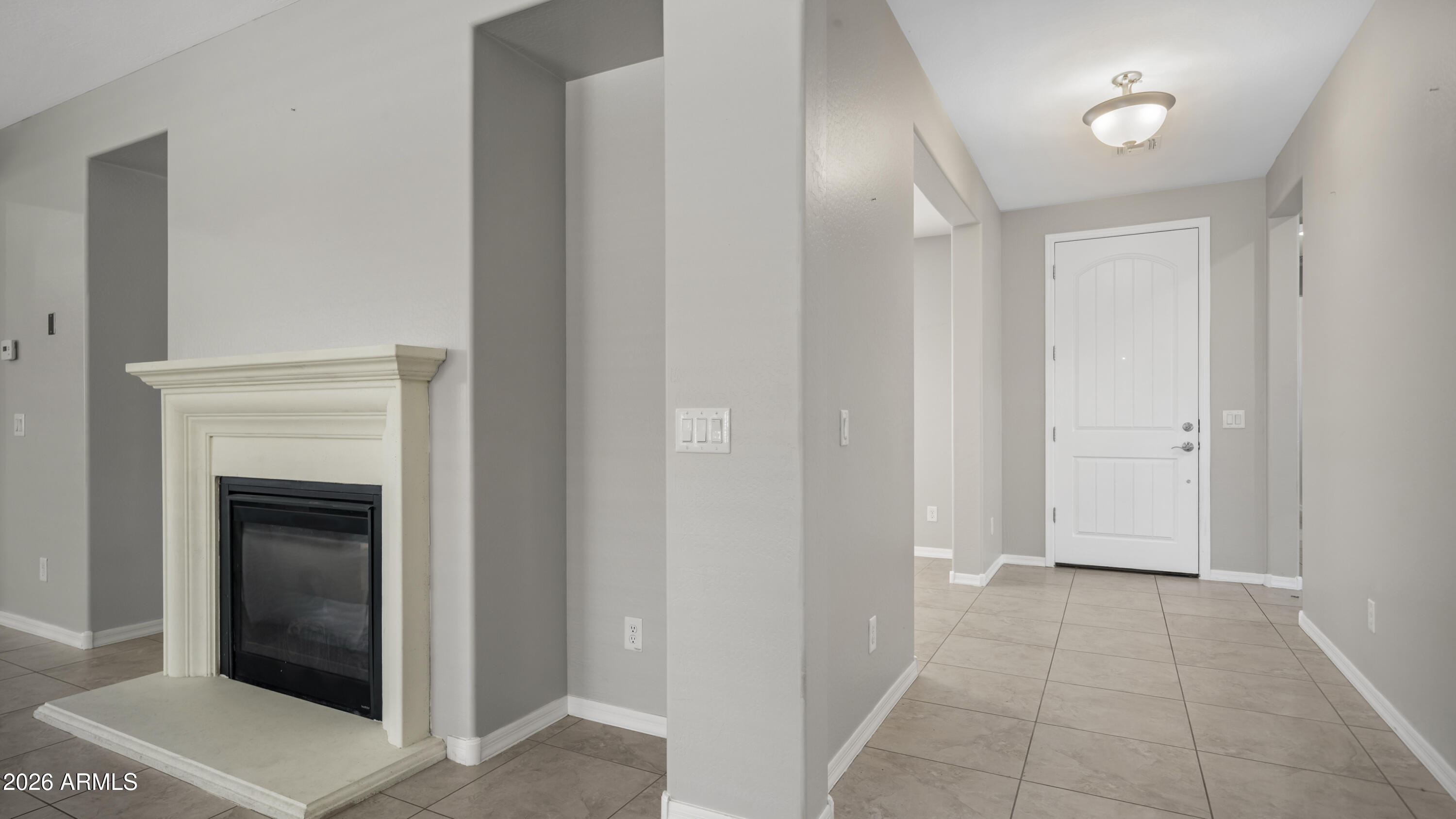 16159 West Granada Road Goodyear, AZ 85395 - Photo 7 of 41 a view of a hallway with entryway
