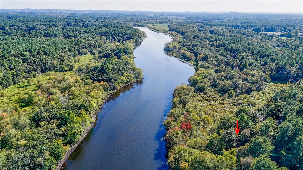 6 Edgehill Road Billerica, MA 01862 - Photo 12 of 15 a view of a lake with mountains in front of it