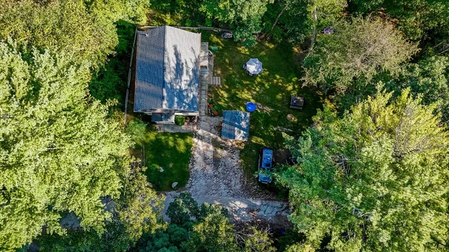 a backyard of a house with lots of green space