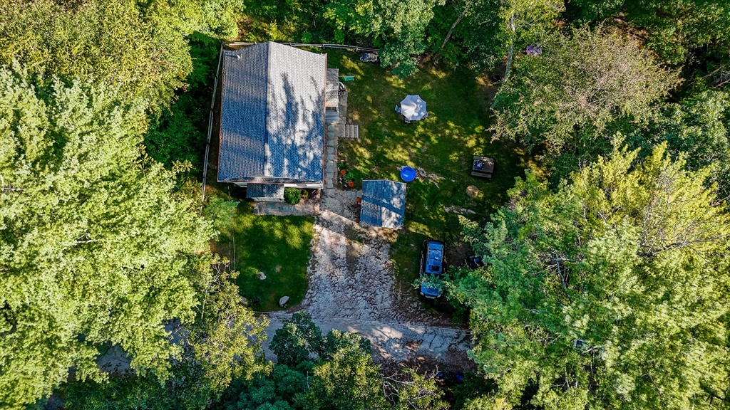 6 Edgehill Road Billerica, MA 01862 - Photo 13 of 15 a backyard of a house with lots of green space