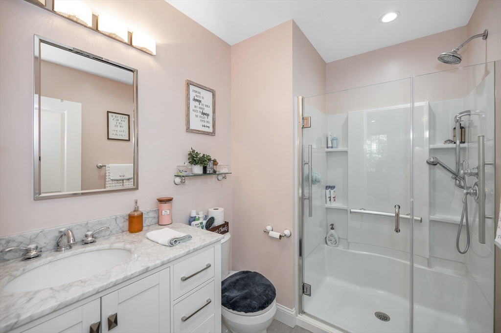 6 Edgehill Road Billerica, MA 01862 - Photo 8 of 15 a bathroom with a granite countertop sink toilet and shower