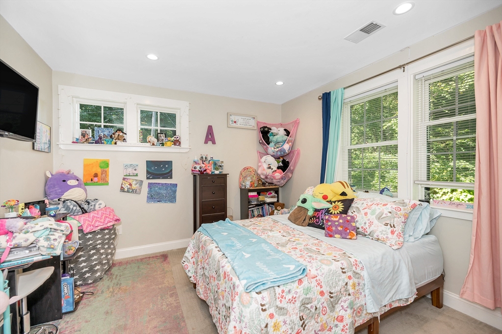 6 Edgehill Road Billerica, MA 01862 - Photo 9 of 15 a bedroom with a bed and a window