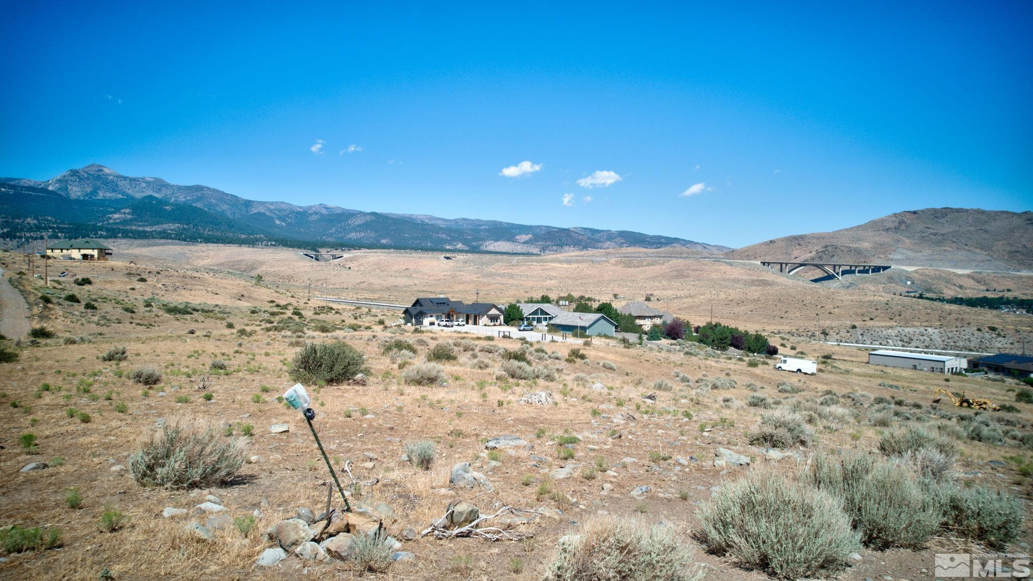 Apn 5017039th Road, Unit D Reno, NV 89521 - Photo 4 of 11 a view of an ocean beach and mountain