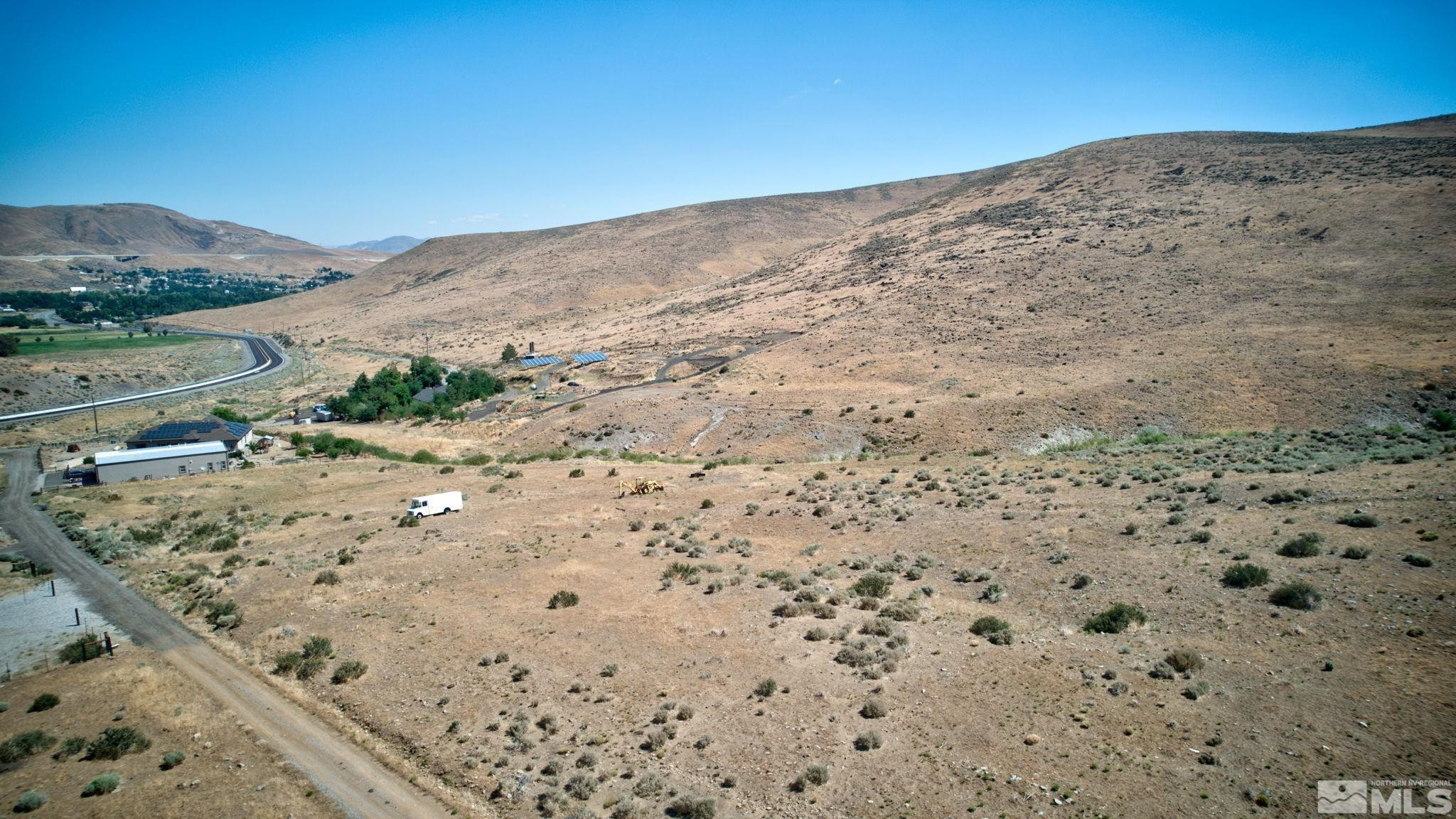 Apn 5017039th Road, Unit D Reno, NV 89521 - Photo 6 of 11 a view of a dry yard with mountain