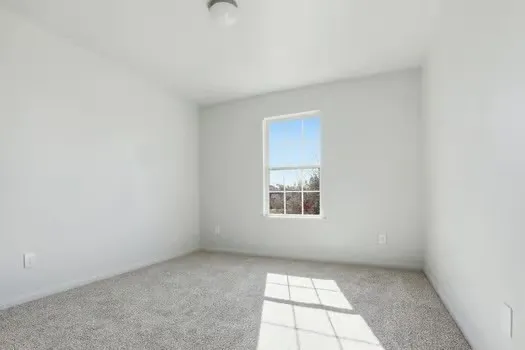 an empty room with a window