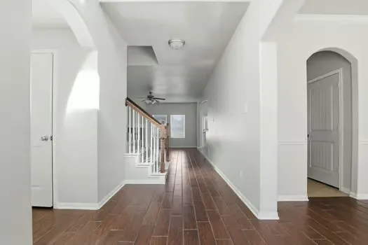 a view of an empty room with a window