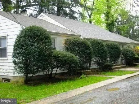 a view of a backyard with a garden