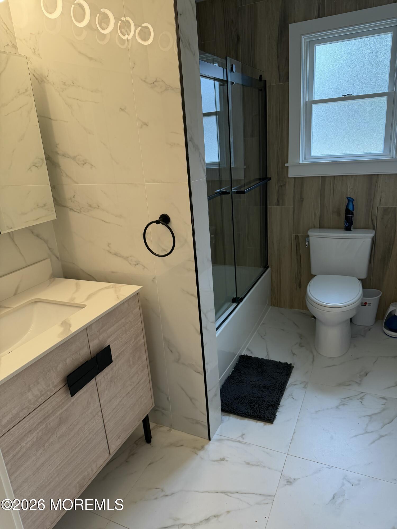 2025 Lesser Parkway Oakhurst, NJ 07755 - Photo 12 of 12 a bathroom with a sink and a toilet