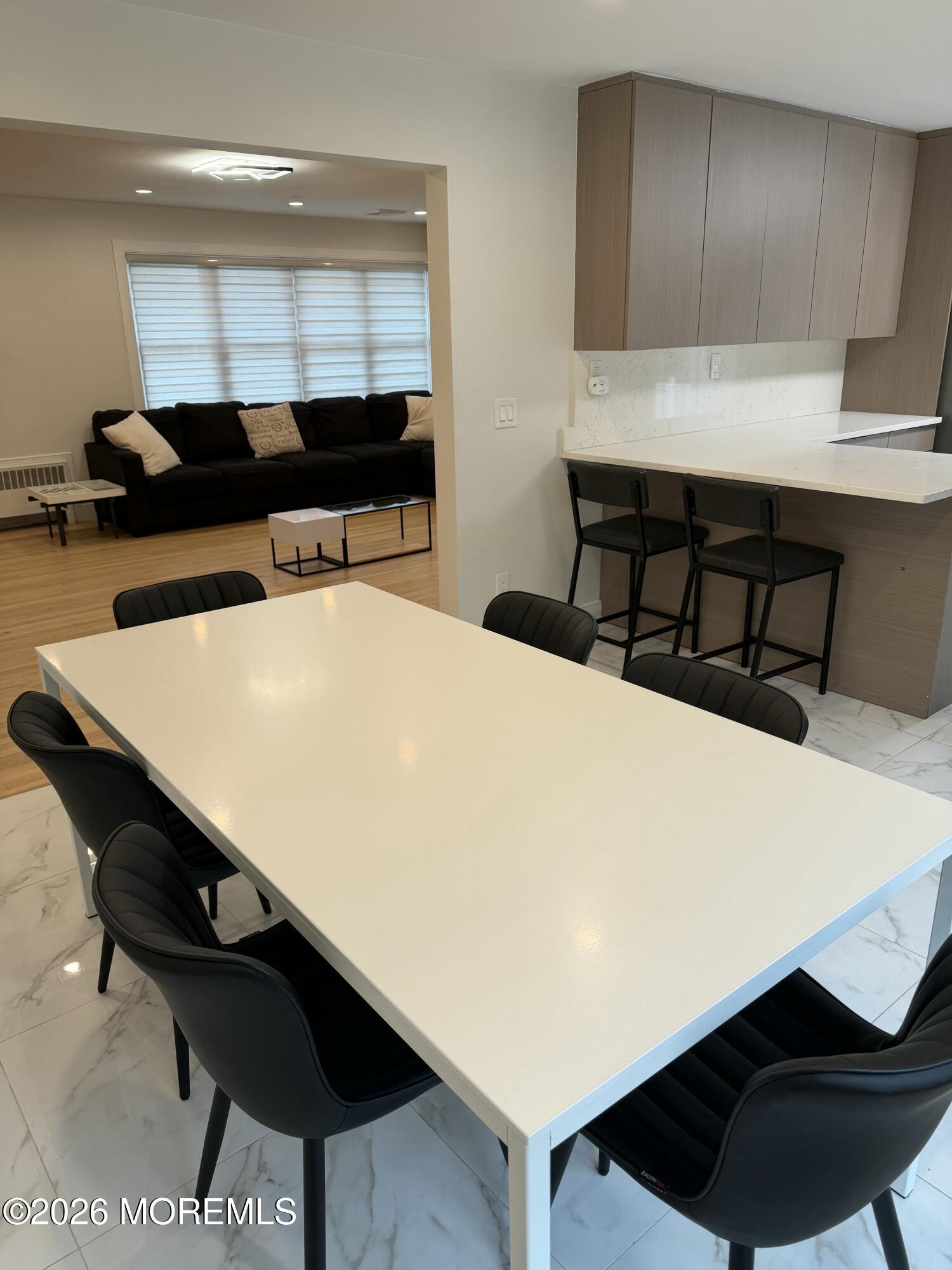 2025 Lesser Parkway Oakhurst, NJ 07755 - Photo 9 of 12 a living room with a couch