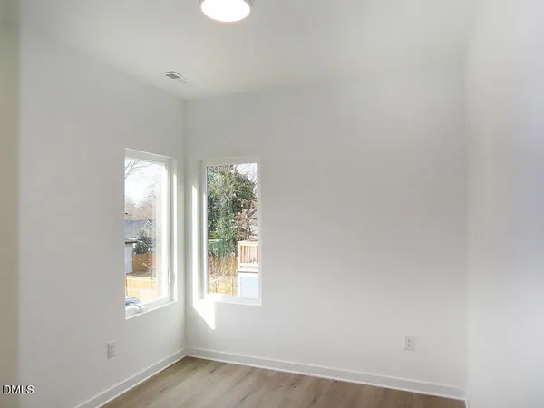 an empty room with windows