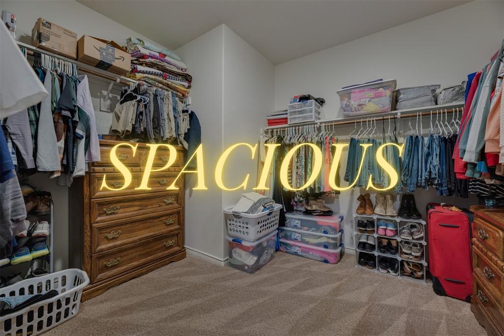 3404 Rio Grande Road Little Elm, TX 75068 - Photo 25 of 39 Spacious walk-in primary closet offering generous hanging space, shelving, and room for additional storage.