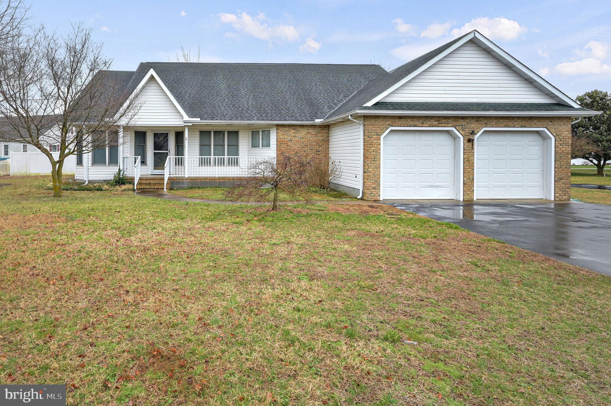 Charming home with spacious yard and garage.