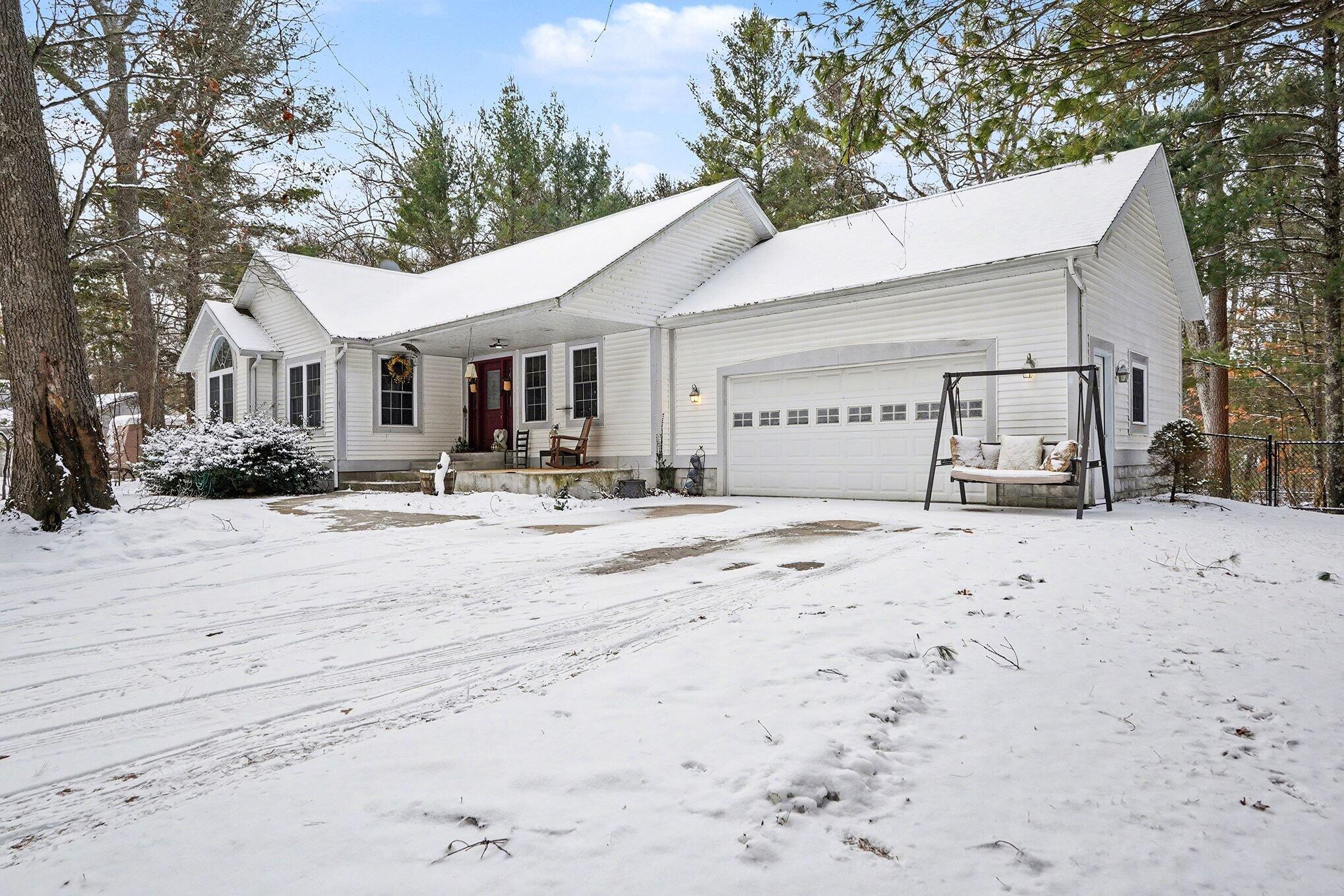 6509 Staple Road Twin Lake, MI 49457 - Photo 3 of 24 front angle