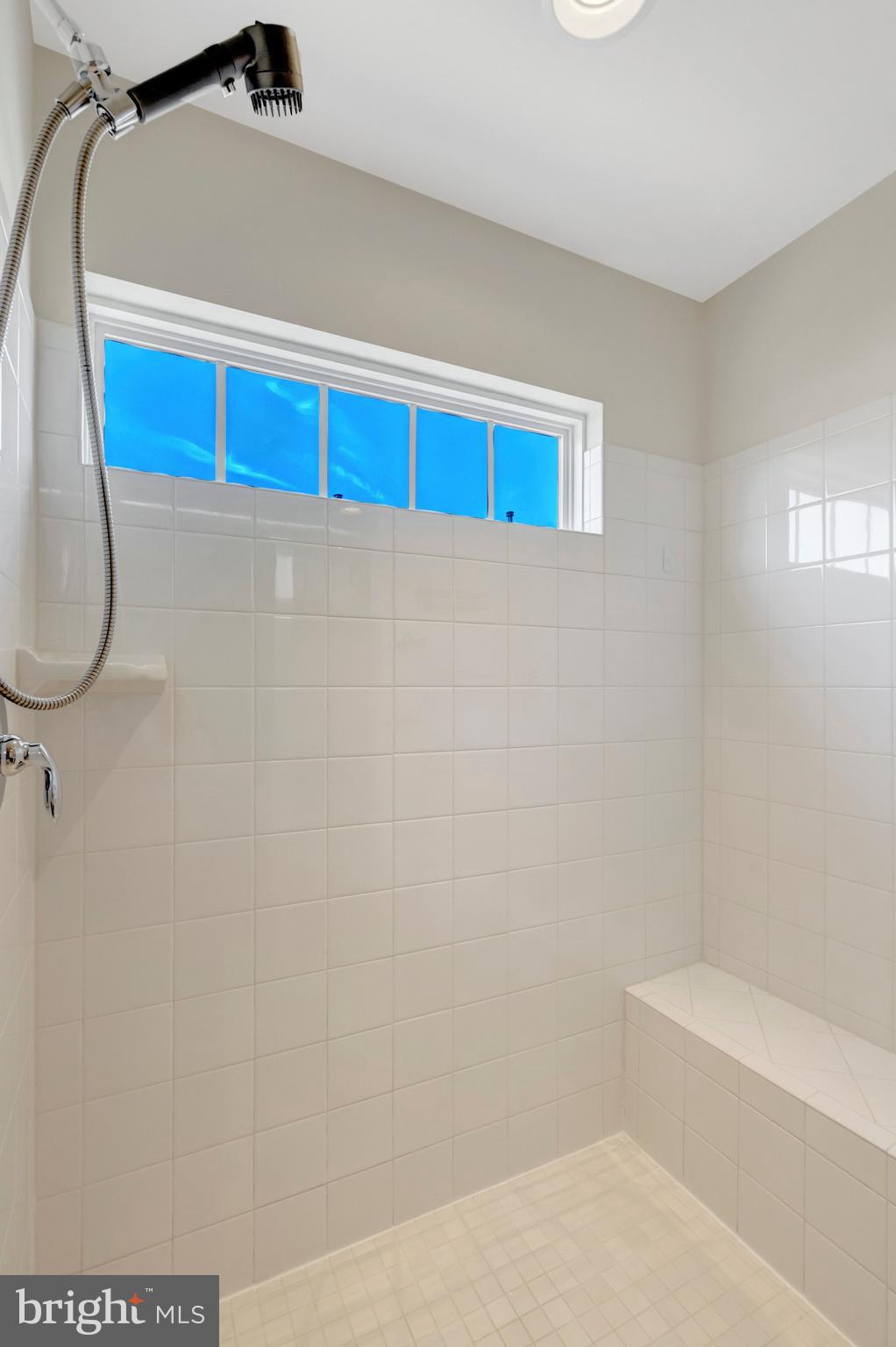 8932 Dahlgren Ridge Road Manassas, VA 20111 - Photo 26 of 41 a bathroom with a sink and a mirror