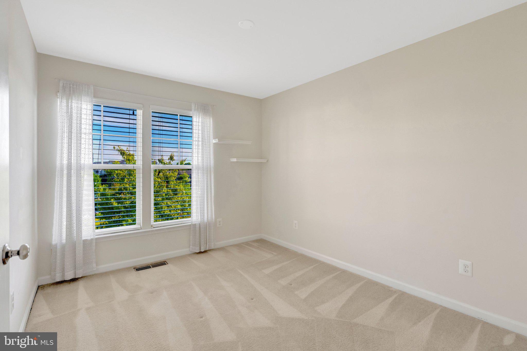 8932 Dahlgren Ridge Road Manassas, VA 20111 - Photo 31 of 41 an empty room with a window