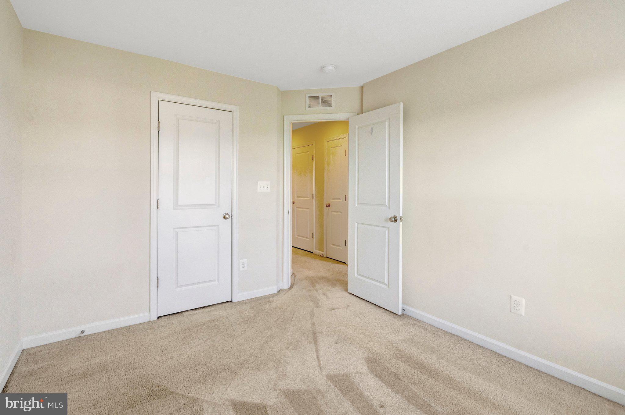 8932 Dahlgren Ridge Road Manassas, VA 20111 - Photo 32 of 41 an empty room with closet area