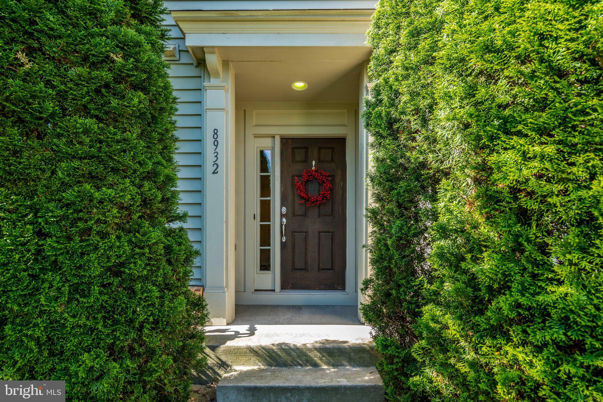 8932 Dahlgren Ridge Road Manassas, VA 20111 - Photo 37 of 41 a view of a entryway door of the house