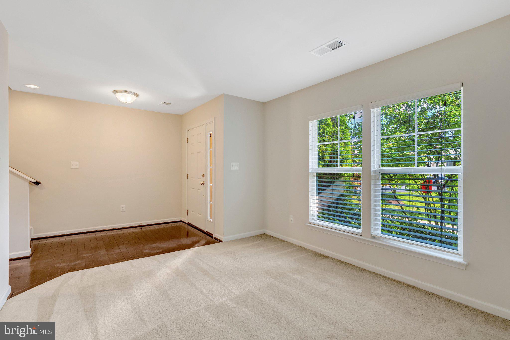 8932 Dahlgren Ridge Road Manassas, VA 20111 - Photo 6 of 41 a view of an empty room with a window