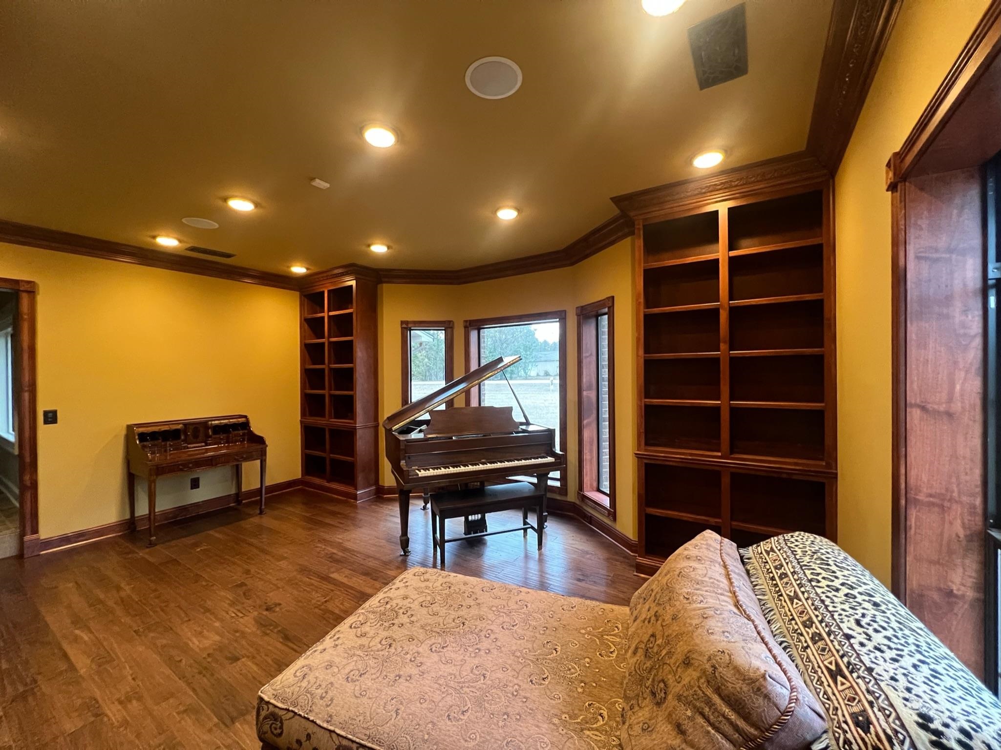 101 Peacock Holler Ripley, MS 38663 - Photo 16 of 25 a view of a livingroom with furniture and a piano