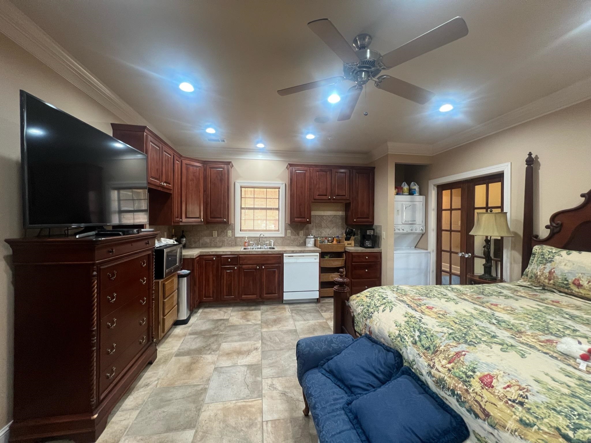 101 Peacock Holler Ripley, MS 38663 - Photo 18 of 25 a large bedroom with kitchen island granite countertop lots of counter top space