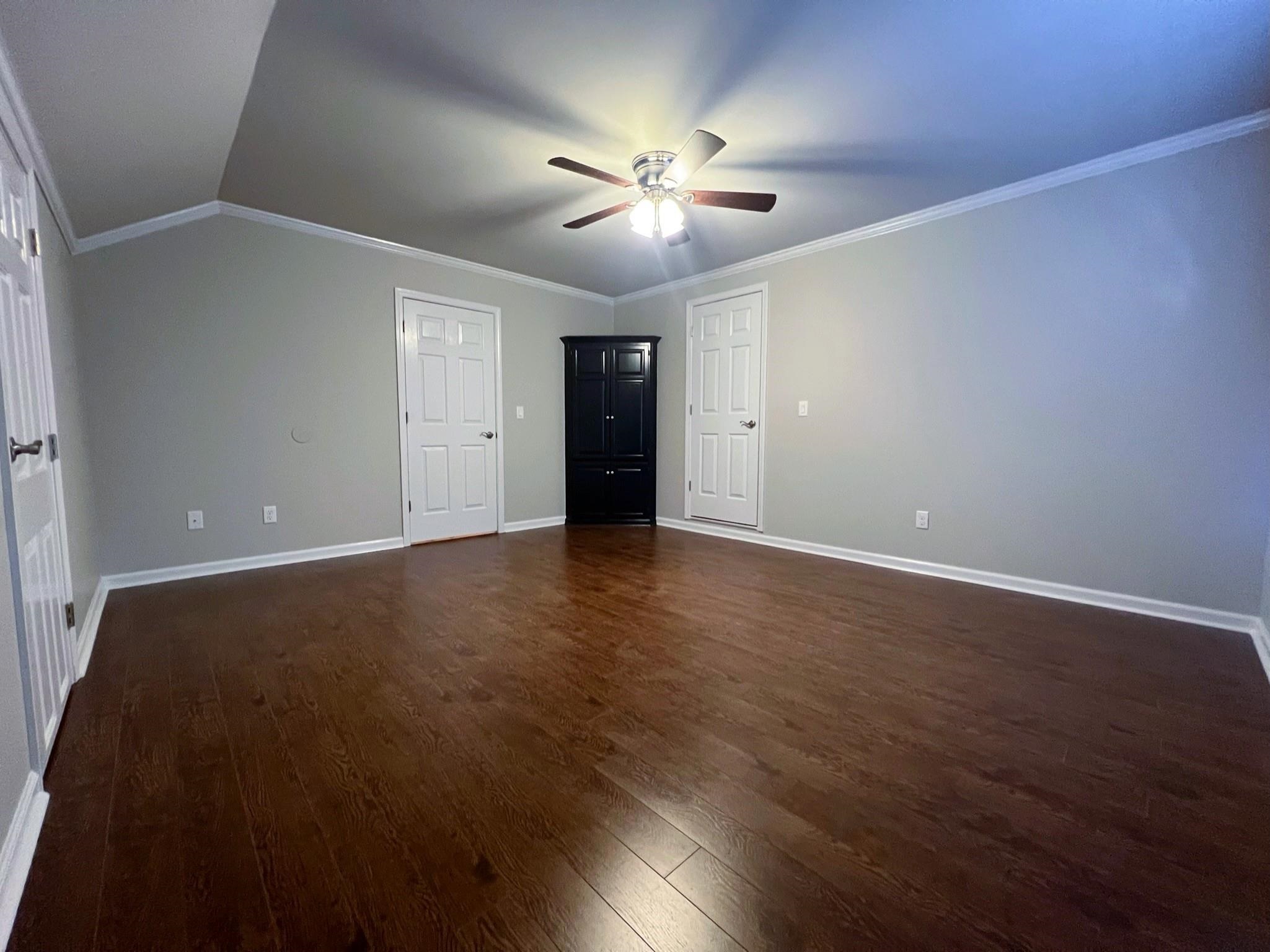 101 Peacock Holler Ripley, MS 38663 - Photo 22 of 25 an empty room with wooden floor and windows