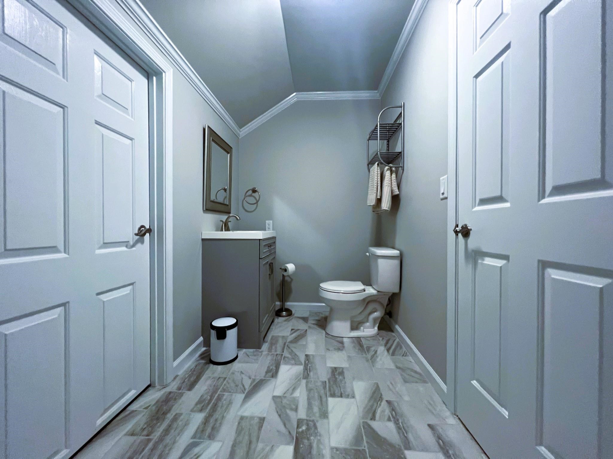 101 Peacock Holler Ripley, MS 38663 - Photo 24 of 25 a bathroom with a toilet