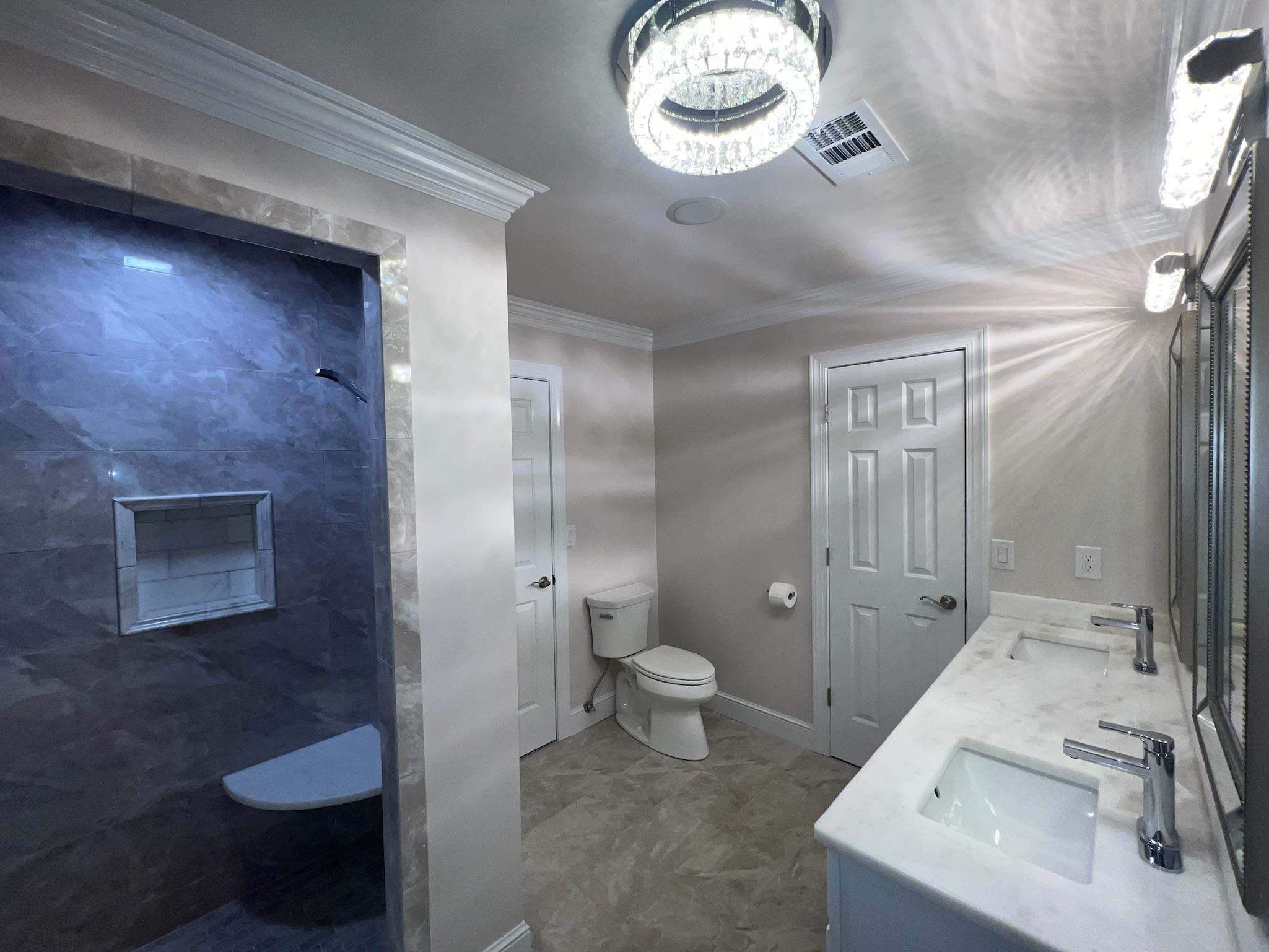 101 Peacock Holler Ripley, MS 38663 - Photo 10 of 25 a bathroom with a sink and a mirror