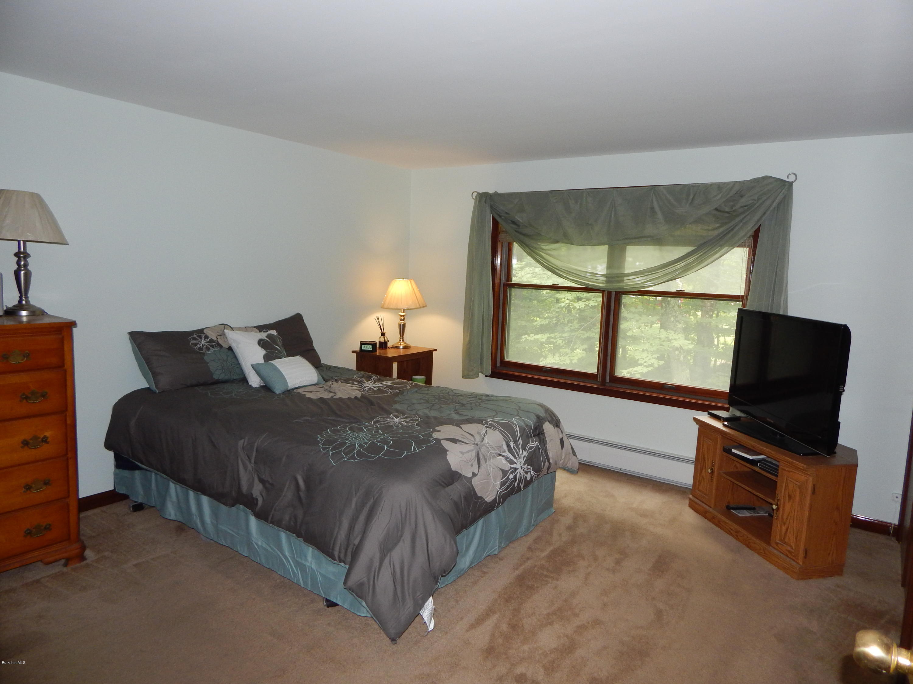 186 High St Hill Road Windsor, MA 01270 - Photo 16 of 29 a bedroom with a bed tv and window