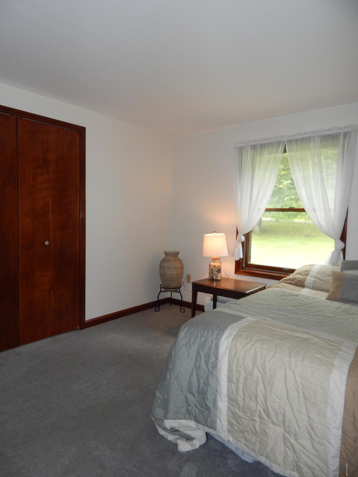 186 High St Hill Road Windsor, MA 01270 - Photo 19 of 29 a bedroom with bed and window