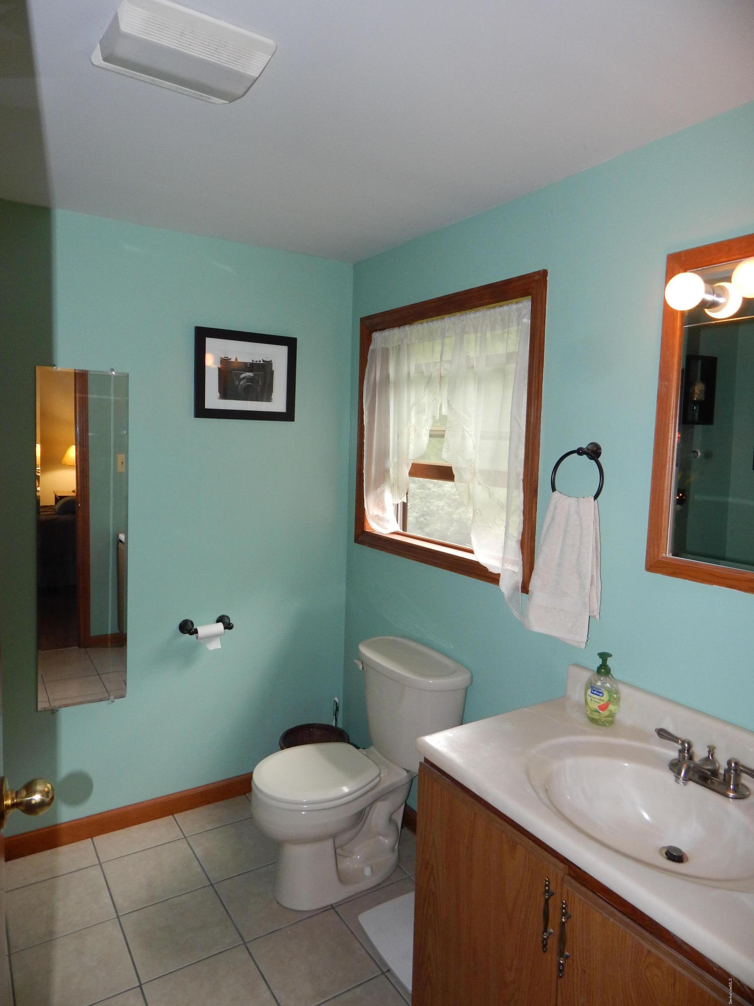 186 High St Hill Road Windsor, MA 01270 - Photo 20 of 29 a bathroom with a toilet sink and mirror