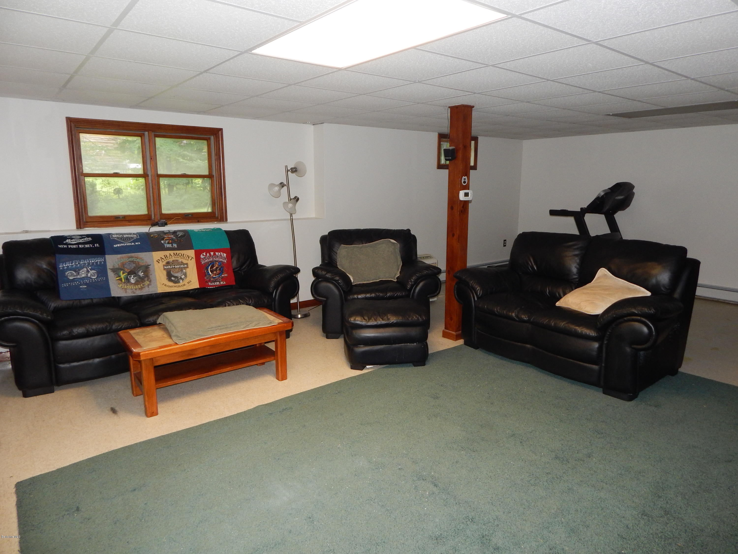 186 High St Hill Road Windsor, MA 01270 - Photo 28 of 29 a living room with furniture and a window