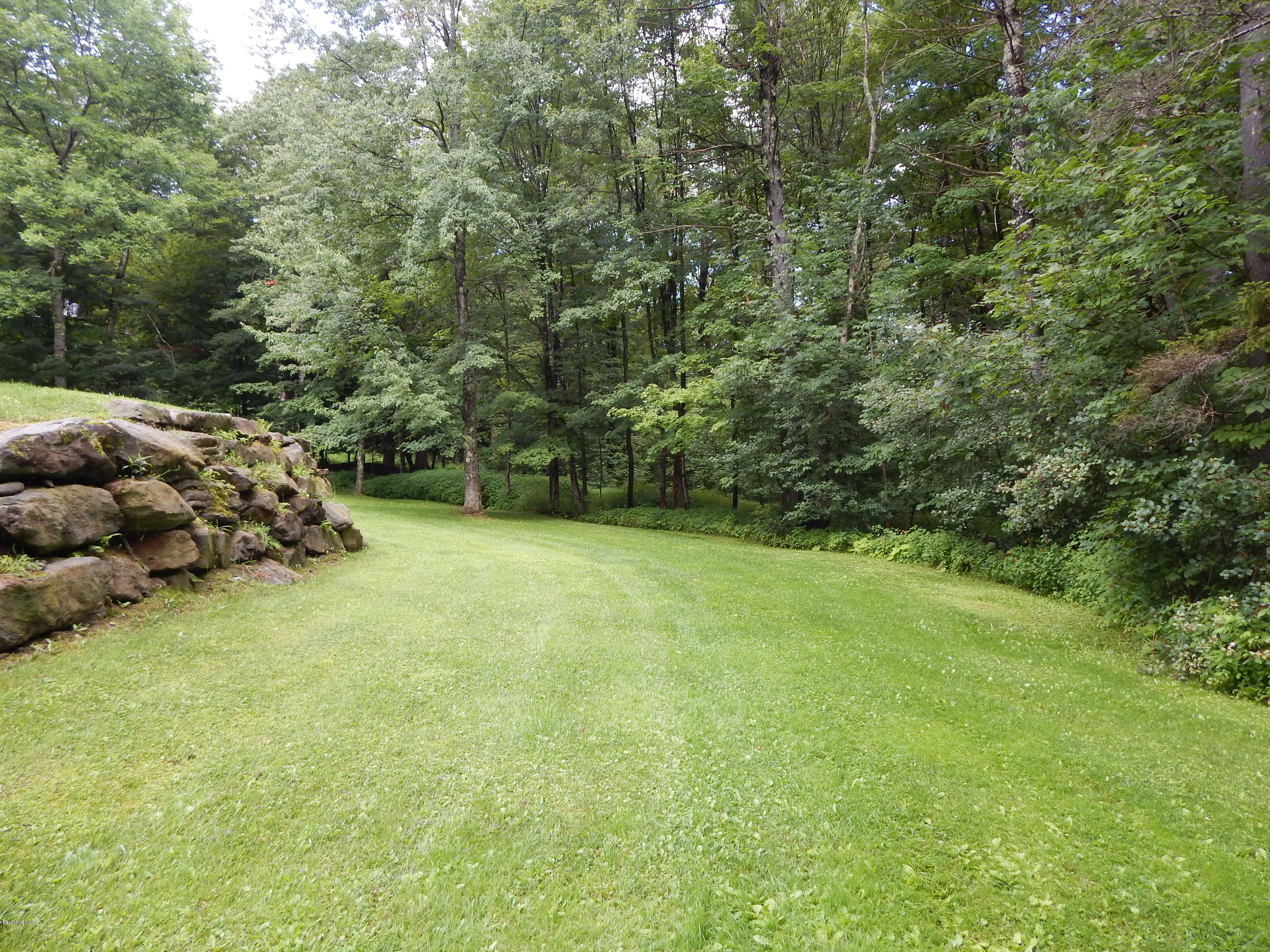 186 High St Hill Road Windsor, MA 01270 - Photo 4 of 29 a backyard of a house with lots of green space