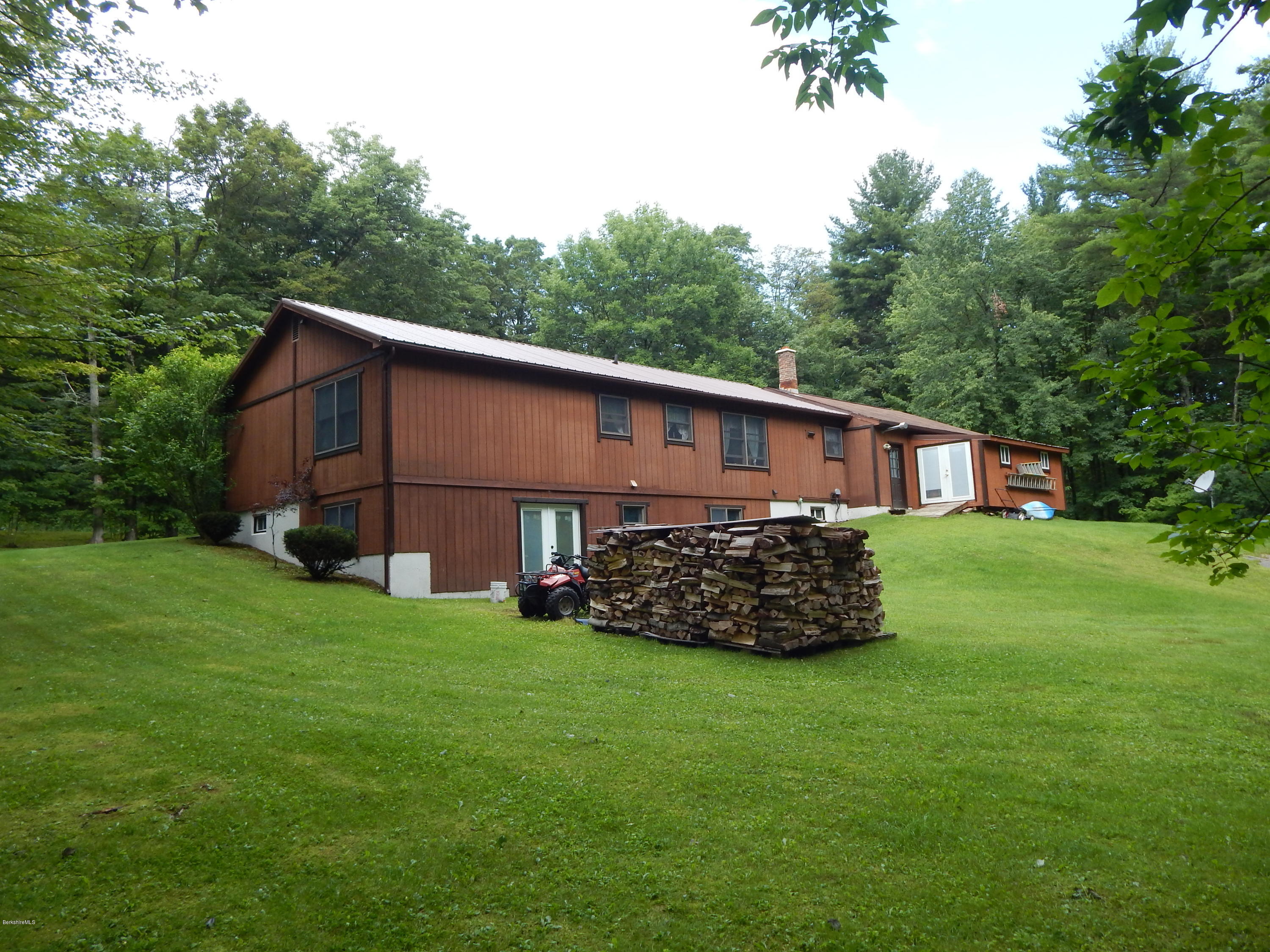 186 High St Hill Road Windsor, MA 01270 - Photo 7 of 29 a view of a house with a yard and sitting area