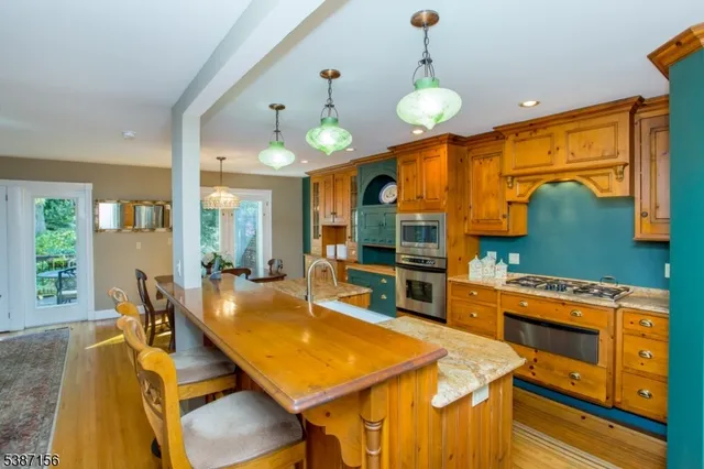 a dining room filled with furniture and window