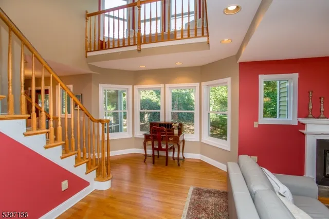 a view of a living room and balcony