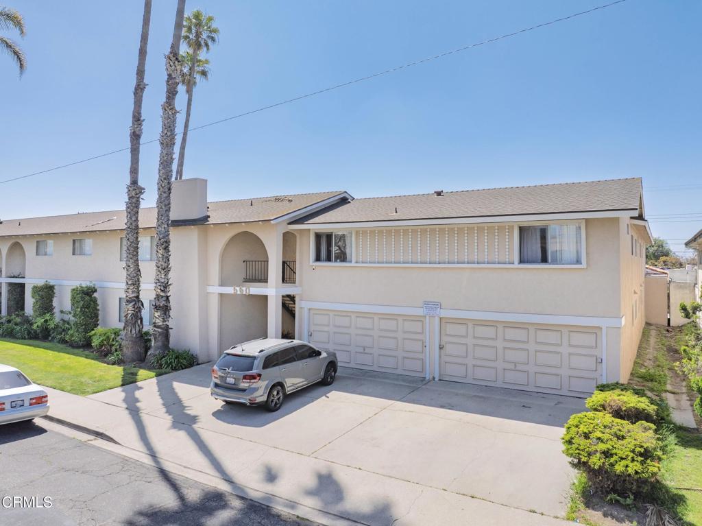 560 West Gonzales Road Oxnard, CA 93036 - Photo 9 of 13 a front view of a house with garden