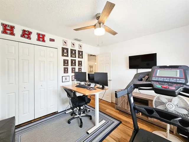 a view of a workspace with furniture