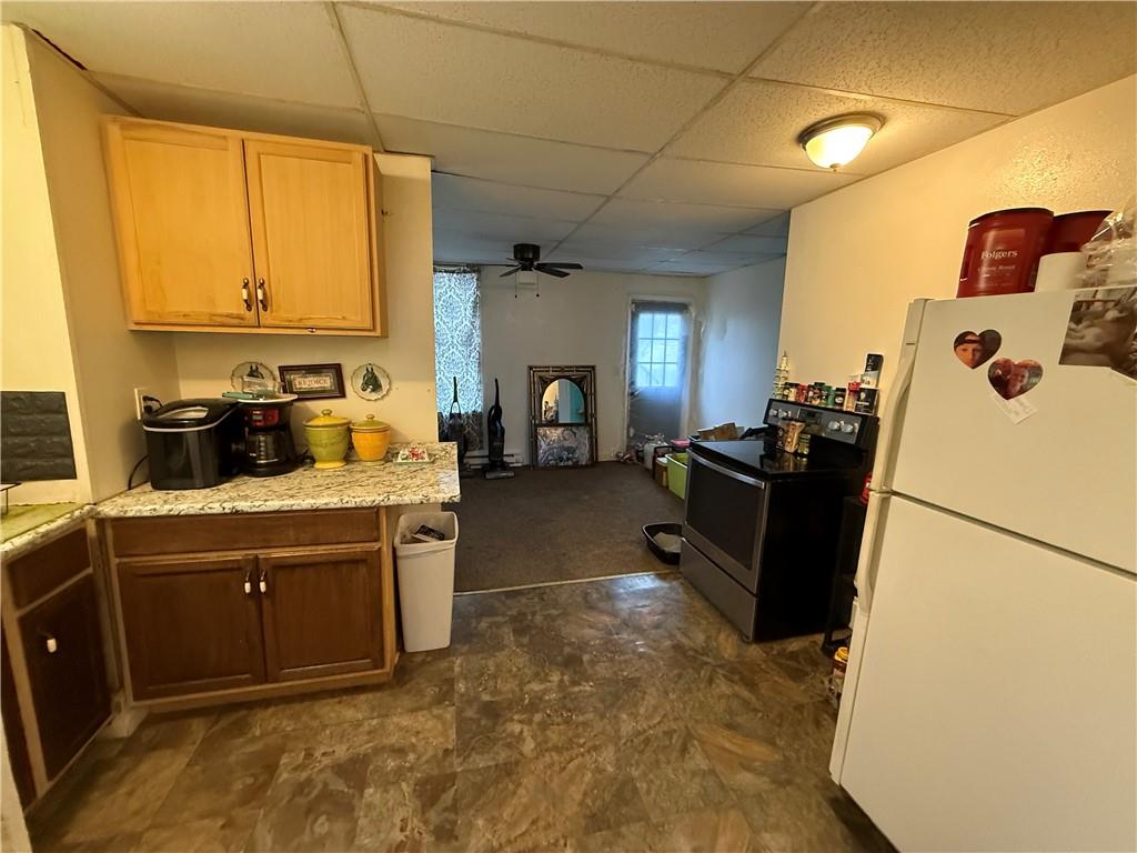 320 West Birch Street Butler, PA 16001 - Photo 21 of 23 a kitchen with refrigerator and window