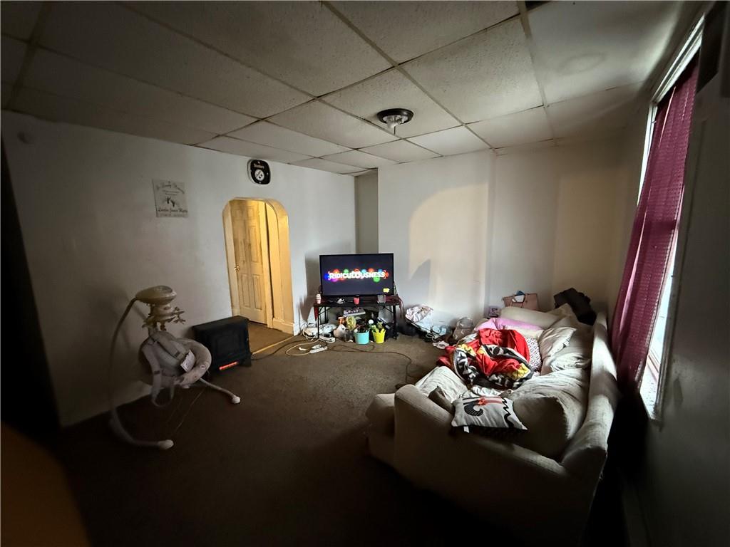 320 West Birch Street Butler, PA 16001 - Photo 6 of 23 a living room with furniture and a chandelier