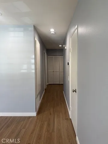 a kitchen with stainless steel appliances granite countertop a refrigerator and a stove