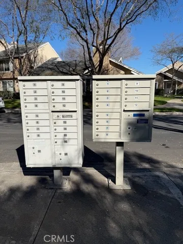 a view of a park with large trees